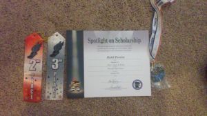 Some of the medals and certificates I collected this track season